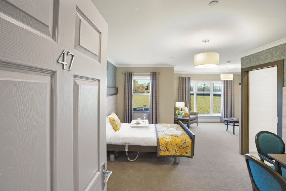 Spacious en-suite bedroom with countryside view